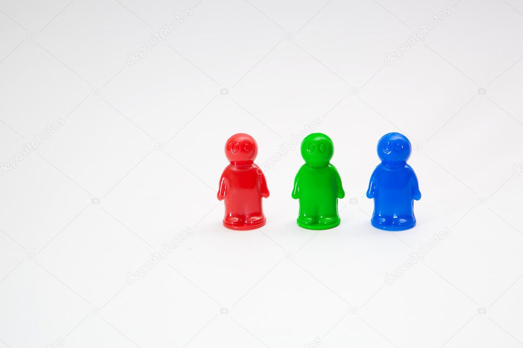 Colorful plastic toy people on white background