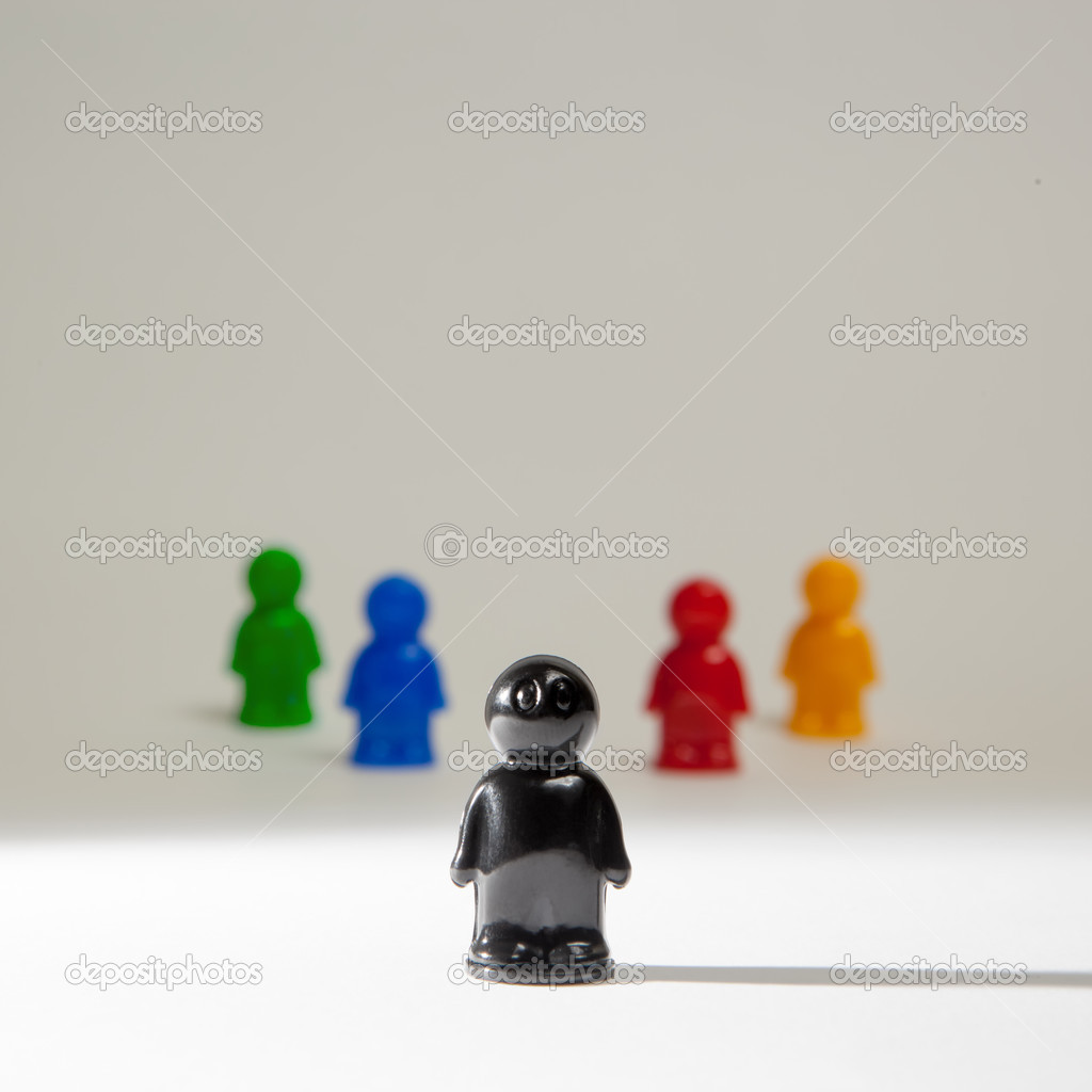 Colorful plastic toy people on white background