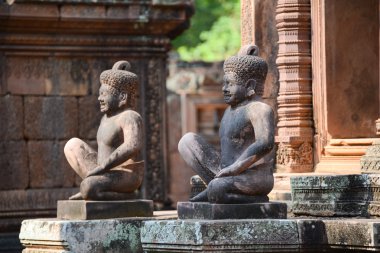 The Statues guard of Banteay Srei temple the entrance to an intricately carved, Angkor Wat clipart