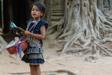 A little girl selling her post card clipart