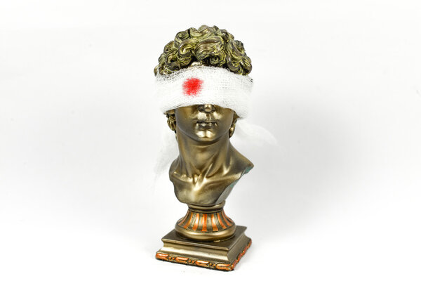 Golden Male Statuettes with white gauze of bloodied