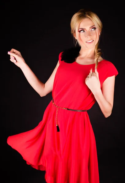Girl in a red dress — Stock Photo, Image