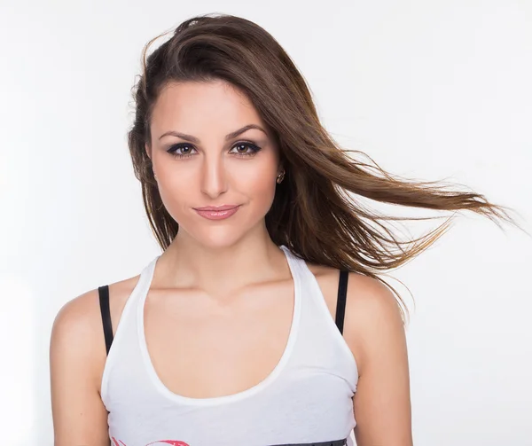 Photo the beautiful girl in a t-shirt — Stock Photo, Image