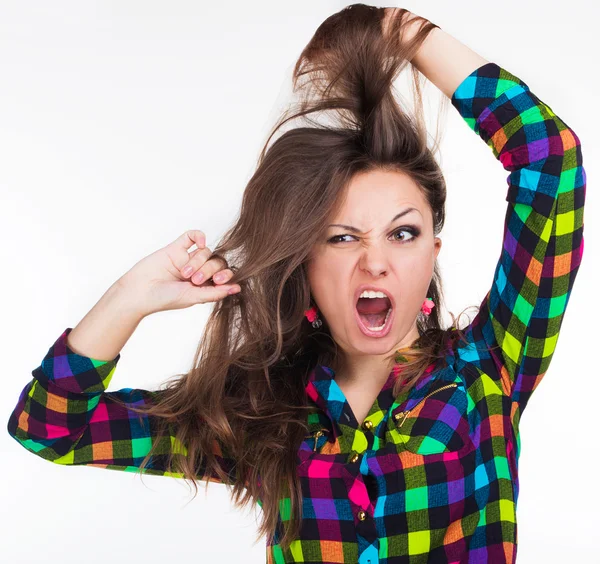 A young girl with a tattoo stretches hair — Stock Photo, Image