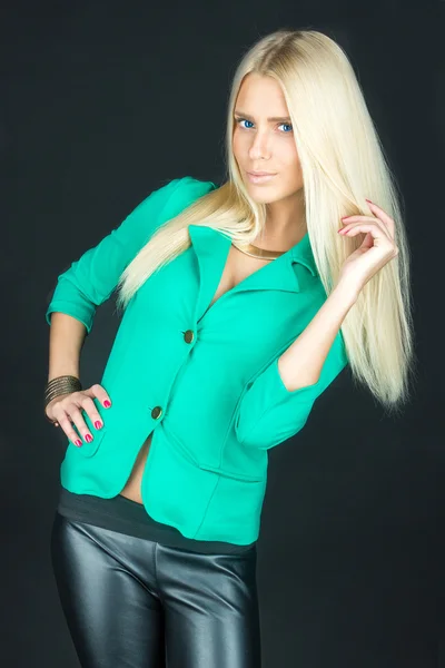 Beautiful girl in the green jacket — Stock Photo, Image