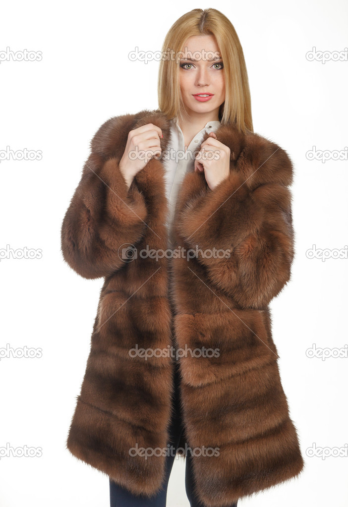 beautiful girl in a fur coat