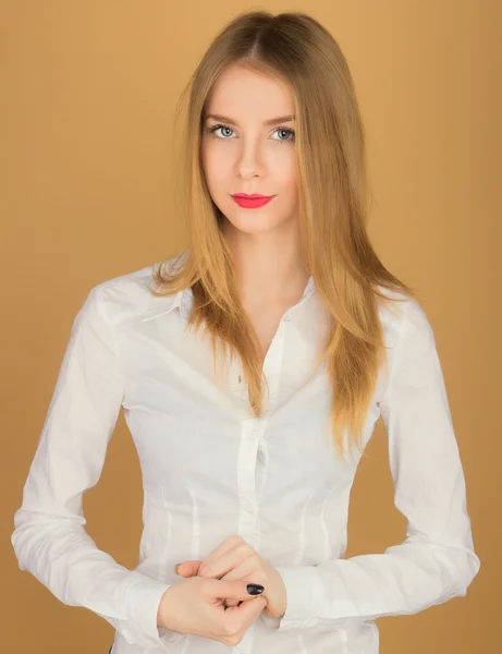 A beautiful young girl in a white shirt — Stock Photo, Image