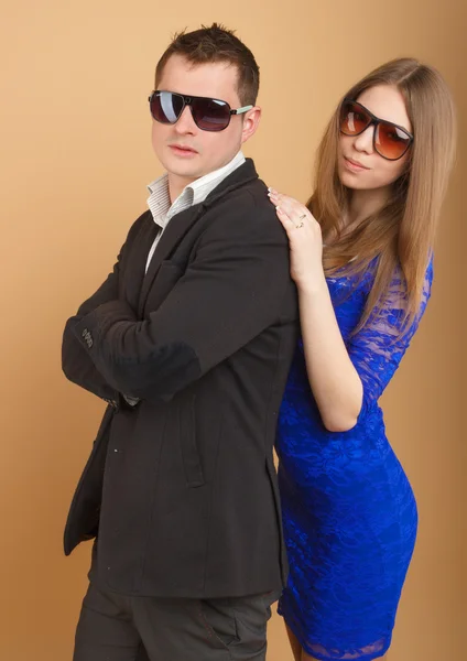 Beautiful guy and girl in business clothes — Stock Photo, Image