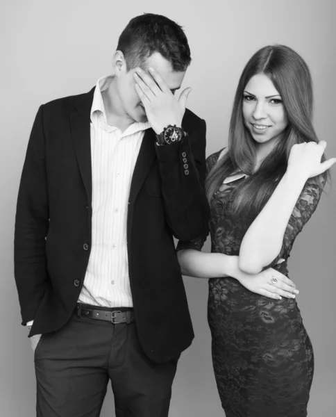 Beautiful guy and girl in business clothes — Stock Photo, Image