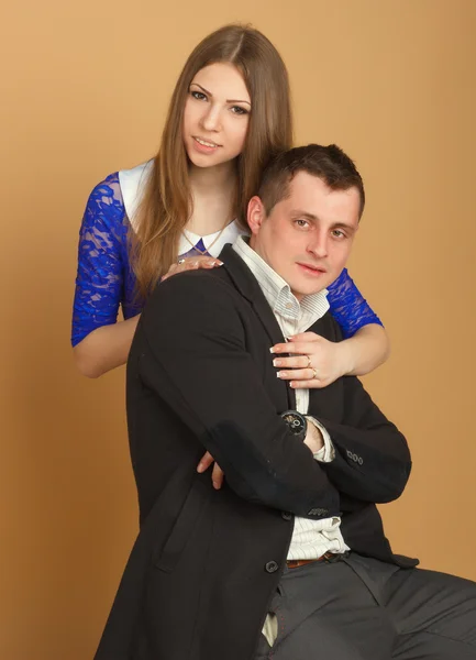 Beautiful guy and girl in business clothes — Stock Photo, Image