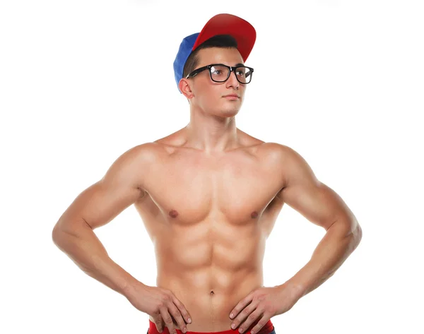 Athletic guy in glasses and a cap — Stock Photo, Image