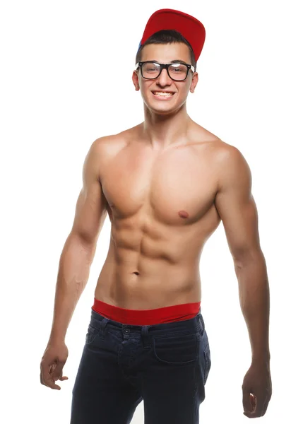 Athletic guy in glasses and a cap — Stock Photo, Image