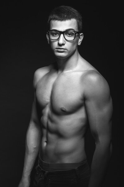 black and white photography sports guy with glasses 