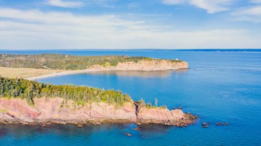 Drone view of Green Island in Canada. Island Aerial View. Beach Island. Blue Water Island.