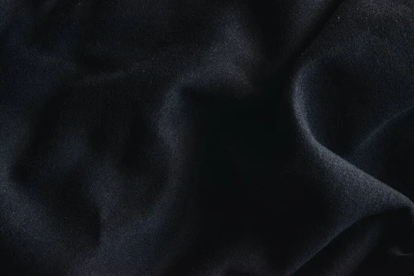 Close up photo of black textile, sweatshirt fabric. — Stockfoto