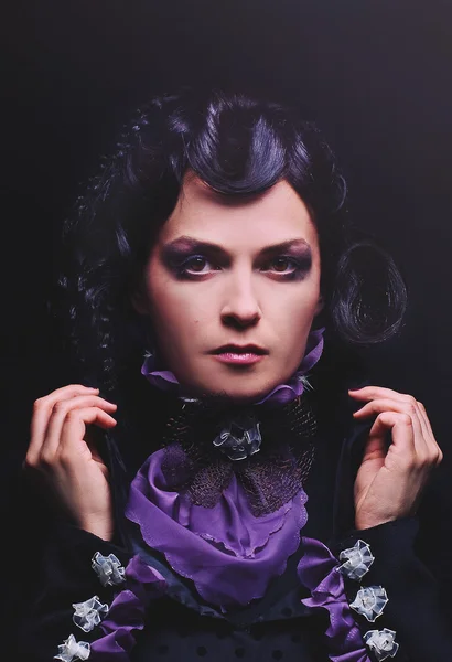 Mysterious violet lady Stock Image