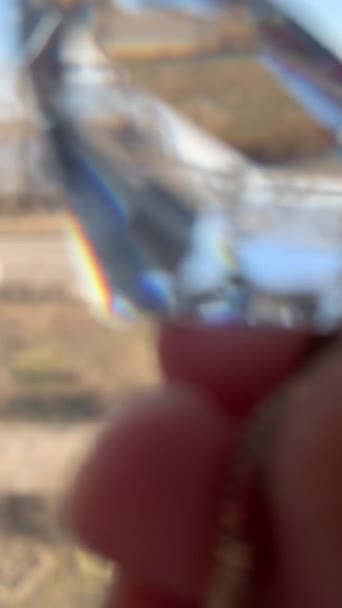 Playing Prism Hand Hold Crystal Glass Stone Look Though Distortion — Stock Video