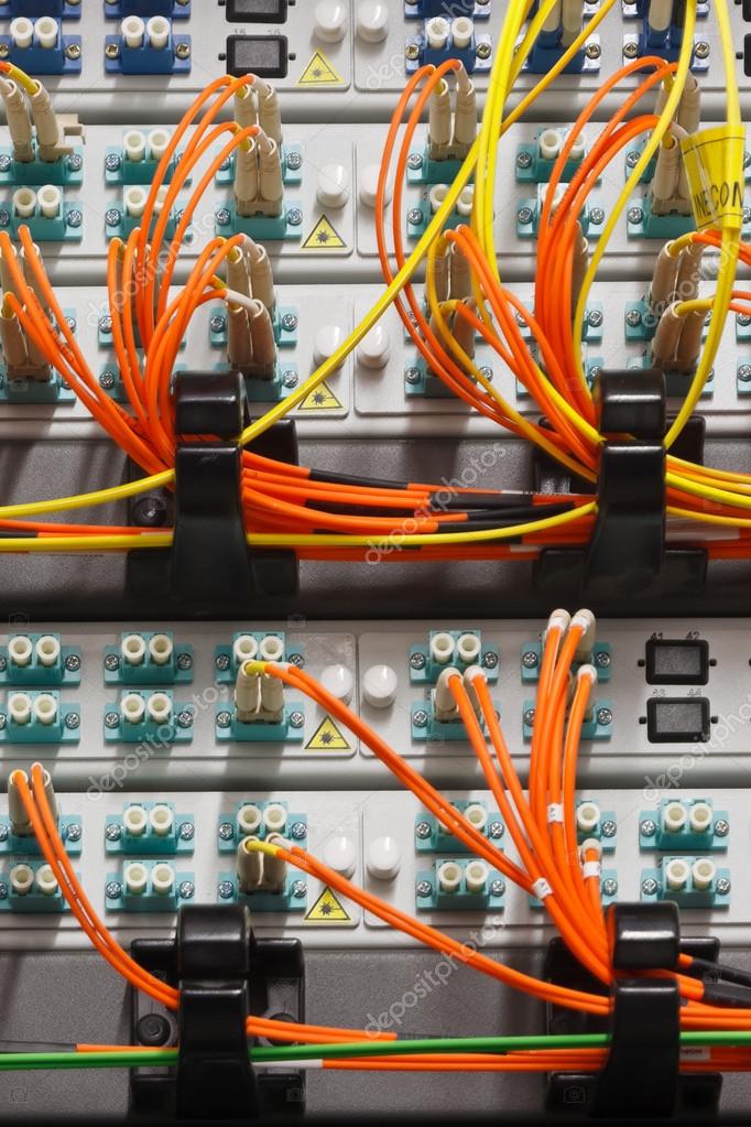 Fiber optics cables connected to a router — Stock Photo © erikzunec