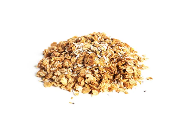 Granola de copos de avena enteros con chips de coco, piña y semillas de chía aisladas sobre un fondo blanco. Muesli aislado. Un desayuno rápido. Desayuno saludable. — Foto de Stock