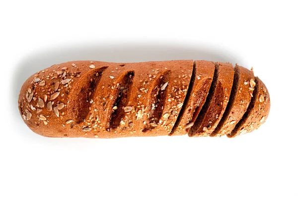 A loaf of rye flour with bran isolated on a white background. — Stock Photo, Image