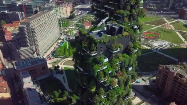 Milan, Italy - October 24, 2021: Aerial view. Modern and ecologic skyscrapers with many trees on every balcony. Bosco Verticale — Stock Video