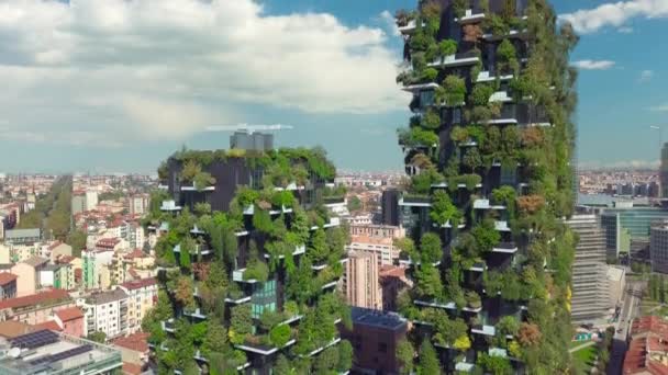 Milan, Italy - October 24, 2021: Aerial view. Modern and ecologic skyscrapers with many trees on every balcony. Bosco Verticale — Stock Video