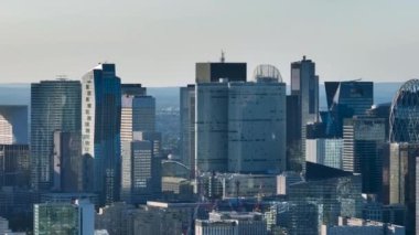 Aerial view. Business district building with wall mirror with blue sky, Paris, France. High quality 4k footage