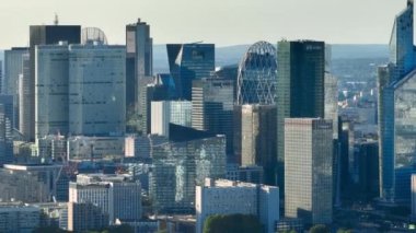 Aerial view. Business district building with wall mirror with blue sky, Paris, France. High quality 4k footage
