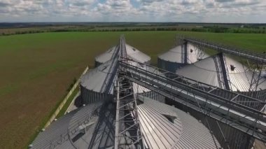 Industrial zone with factory or Plant processing of sunflower oil and oilseeds. Aerial view. High quality FullHD footage