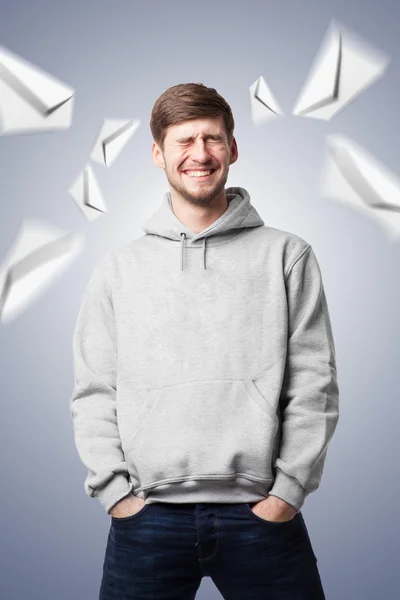 Handsome young man with letters — Stock Photo, Image