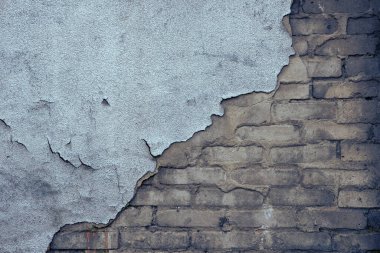 Çatlaklar ve çizikler olan eski renkli duvarın soyut grunge dokusu. Yaratıcı bir geçmiş. Mavi, gri, turuncu ve kahverengi eskimiş taş desenli, sıva ve boyalı. Boşluğu kopyala
