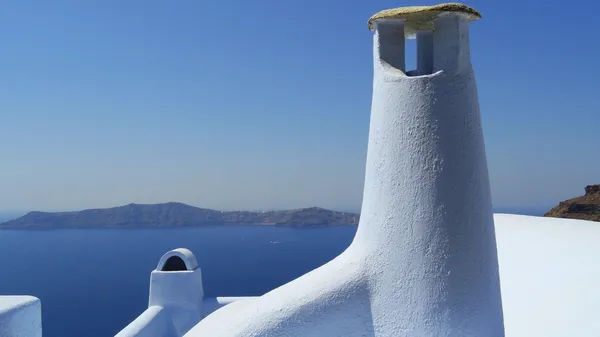 Pictoresque chimney on the island of Santorini — Stock Photo, Image