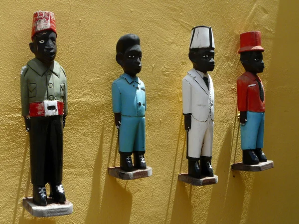 Pequenas esculturas no museu Kura Hulanda, Curaçao Imagens De Bancos De Imagens