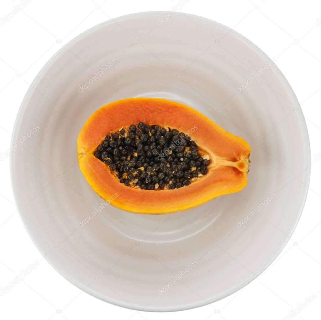 Papaya on a plate, white background