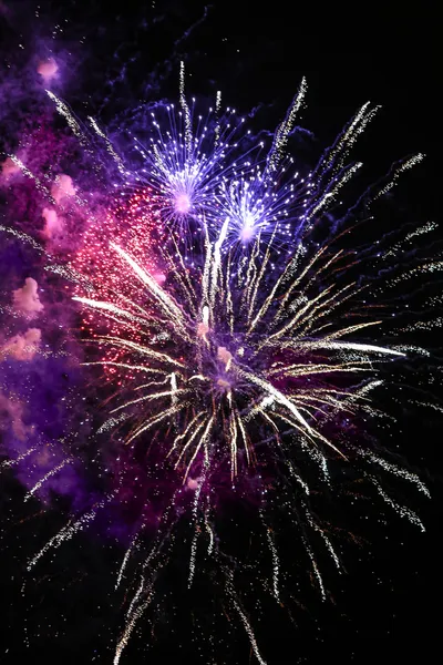 Multicolor fireworks over night sky — Stock Photo, Image
