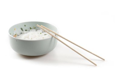 Image of isolated bowl with noodle with sticks