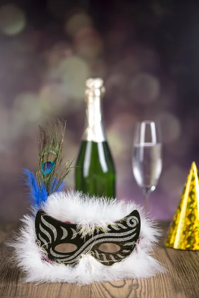 Fancy dress ball, Carnival mask, glass of champagne, celebrate New Year's Eve — Stock Photo, Image