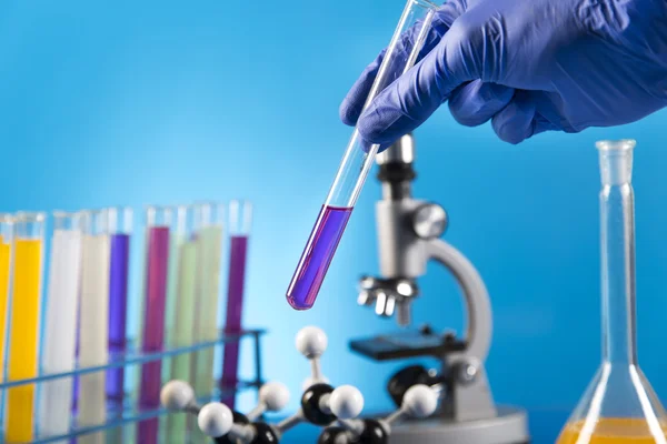 Workplace modern laboratory for molecular biology test on blue background — Stock Photo, Image