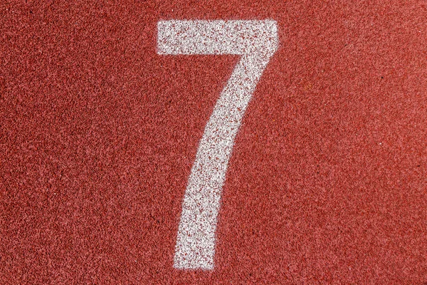 "7" Numbers on red running track — Stock Photo, Image