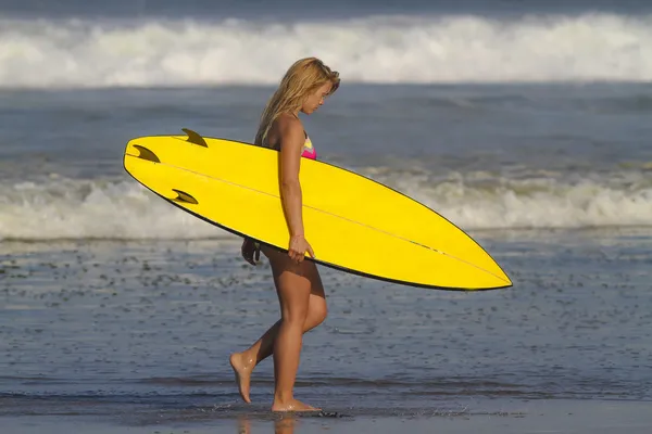Female surfer on beach — Stock Photo, Image