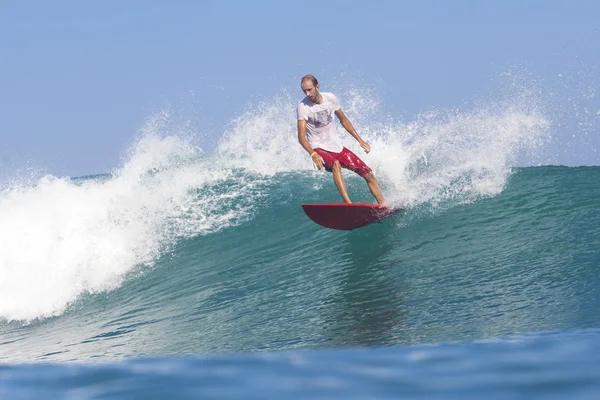 Surfer on waves — Stock Photo, Image