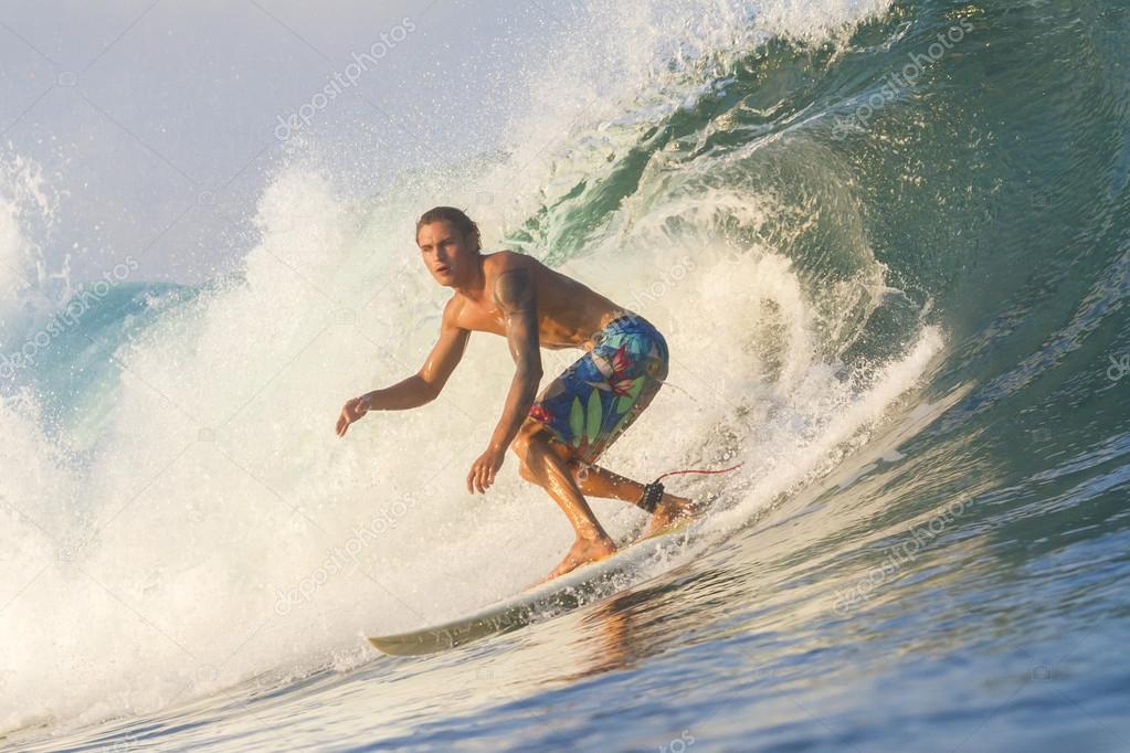 Surfer on waves Stock Photo by ©trubavin 39951189