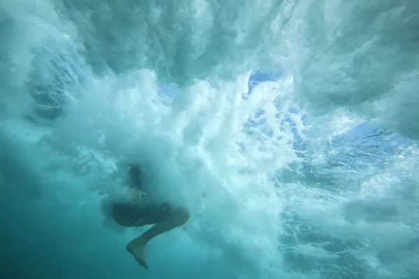 Surfer underwater — Stock Photo, Image