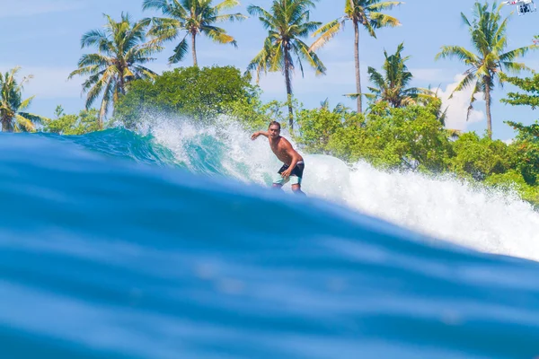 Surfing a Wave. Bali Island. Indonesia. — Stock Photo, Image