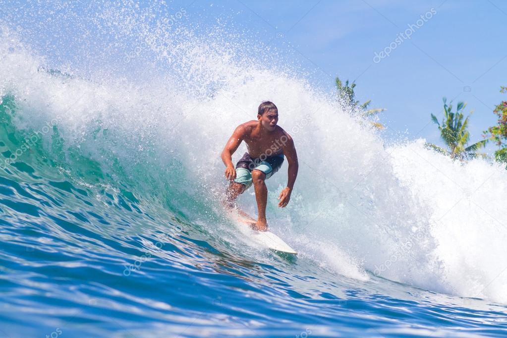 Surfing a Wave. Bali Island. Indonesia.