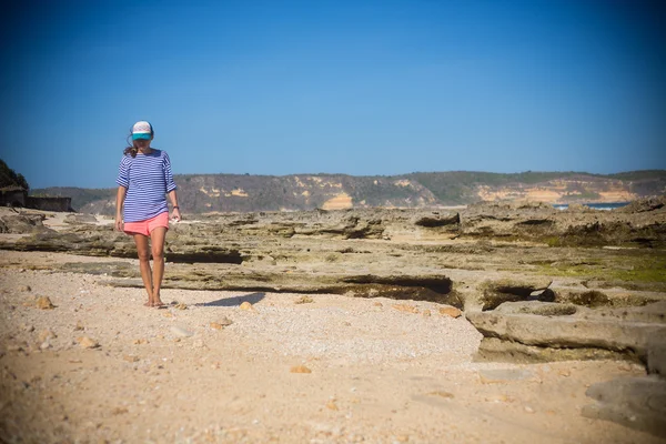 Woman Walks Alone on a Deserted Beach — Stock Photo, Image