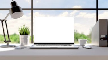 Laptop with blank green screen. Static footage with trees swaying or moving in the wind. Home interior or loft office background, 4k 24fps UHD, loop video