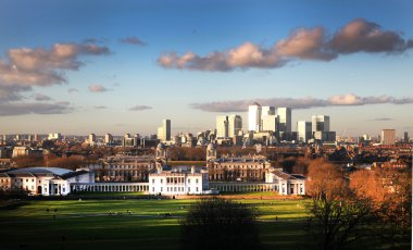 Greenwich park, Royal Navy college and Queen palace and Canary Wharf business international finance aria on the background clipart