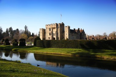 HEVER CASTLE AND GARDENS, KENT,  UK - MARCH 10, 2014: 13th century castle with Tudor manor house and 250 acre of park. clipart