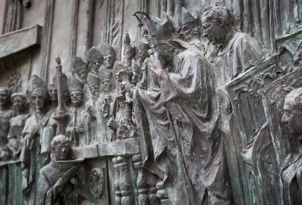 MADRID, SPAIN - MAY 28, 2014: Bas-relief on the door of neo-gothic of Santa Maria la Real de La Almudena in Madrid, Spain. — Stock Photo, Image